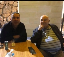 With municipal police officer Mohammad Nasser Al-Din.