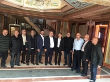 Upon receiving the Nasser Al-Din family from the town of Deir Antar at his residence.